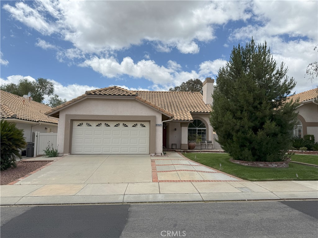 Sun Lakes Country Club is a Senior Living Resort with age restrictions per HOA. (One of the occupants must be 55 years old to live in the community.) This home is a lovely St. Moritz floor plan located on the Golf Course with an Awesome View. It has 2 bedrooms, 3 bathrooms with a loft, formal living, formal dining and a family room. Flooring is hardwood oak and carpeting; Kitchen and bathroom have granite countertops; Kitchen also has a stainless steel stove and painted cabinets. There is a custom-built-in cabinet located in the hallway. Outside we have a solid patio cover, dog run and vinyl fence. The garage has storage cabinets, 2 attic ladders for that extra storage space. Sun Lakes Country Club is located near shopping, entertainment and restaurants with Morongo Casino and Desert Hills Premium Shopping Mall 15 minutes east on Highway 10. Some of the amenities in Sun Lakes are: Championship Golf Course, Executive Golf Course, 3 club houses, Restaurant & Lounge, Tennis, Swimming (inside & outside), Bocce Ball, Pickle Ball / Paddle Ball and 3 Gyms and many many clubs to join. All an active adult could ask for.