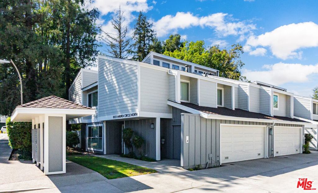 Beautifully Upgraded 3-Bedroom End-Unit Townhome in the Northridge Townhome Estates Community! This 2-Story stunner has undergone a recent renovation w/ designer finishes throughout. Oversized windows let in ample amounts of natural light, all fitted w/ wooden shutters for privacy. Shaved oak hardwood flooring adds elegance & class to a fantastic layout. Living room w/ stone fireplace. Adjacent patio doors leading to spacious private outdoor patio area - perfect for a morning coffee or evening cocktail! Dining area w/ chandelier. Upgraded chef's kitchen w/ white shaker cabinets, quartz countertops, subway tile backsplash, & stainless-steel appliances. Huge 2nd floor loft area w/ built-in cabinetry (can possibly be converted to a 4th bedroom). Master Bedroom Suite w/ soaring vaulted ceilings, upgraded bathroom w/ dual vanities, & large walk-in closet. Laundry room w/ plenty of storage. Central AC + heat. 2 car attached garage w/ storage. Community amenities include 3 swimming pools, 3 tennis courts, clubhouse, & gym/sauna. Water, sewer, trash, & earthquake insurance all included in monthly dues. Across the street from Northridge Park & just minutes to the best shopping, dining, & entertainment the area has to offer. A truly turnkey unit that feels like a single-family residence!