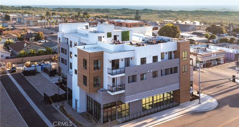 Photo of 402 W Grand Avenue #302, Grover Beach, CA 93433 (MLS # PI25233156)