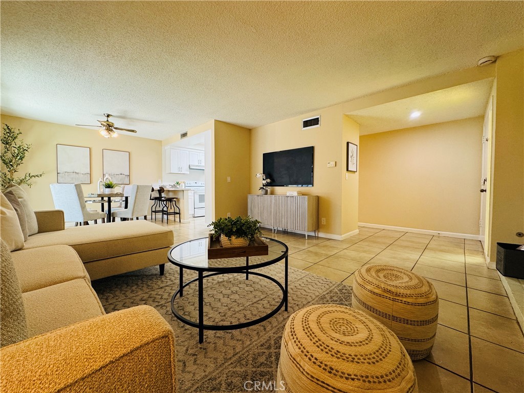 Move in ready! Gated community! This stunning single-story condo, with no neighbors above or below, is located in the highly desirable Tustin Park Villas community in the heart of Tustin. Ideally situated within the complex adjacent to lush greenbelts and sharing only one wall, this home boasts one of the best locations in the community.
The residence features 3 spacious bedrooms and 2 full bathrooms, filled with natural light from multiple directions. Numerous upgrades include fresh interior paint, new laminate flooring, a fully renovated kitchen with new appliances, and updated bathroom sinks and cabinetry.
Enjoy the inviting living room that opens to a large private patio—perfect for relaxing or entertaining with a barbecue. Double-pane windows and pride of ownership throughout ensure this home has been meticulously maintained and move-in ready for the next homeowner.
The property includes a shared one-car garage, with ample guest and street parking available on Mitchell Avenue. Community amenities feature a swimming pool, beautifully landscaped greenbelts, and more.
Conveniently located just minutes from shopping centers, restaurants, and major highways (5, 55, and 261), and a short drive to Irvine. Don’t miss the opportunity to own this exceptional home—it won’t last long!