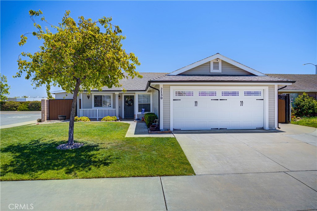 Welcome to this beautifully updated 3bd, 2ba home on a desirable corner lot in Santa Maria's Paseo Del Sol community, offering 1,109 sqft of stylish and functional living space. The home features a bright open layout with seamless flow between the living room, dining area, and kitchen—perfect for comfortable living and entertaining. The kitchen has been recently updated with a large quartz island, tile backsplash, added cabinetry, and a built-in beverage fridge. A sliding glass door off the dining area leads to a fully cemented backyard, ideal for indoor-outdoor living. Throughout the home, you'll find durable tile flooring and two remodeled bathrooms with modern vanities, tile showers, updated fixtures, and glass doors. Additional upgrades include a newer HVAC system, water heater, programmable thermostat, four ceiling fans, and a smart front door lock. Exterior improvements include two storage sheds, a finished garage with attic access, a widened driveway, a custom-built fence with matching entry gate, and new sod and irrigation in the front yard—making this move-in ready home a must-see!