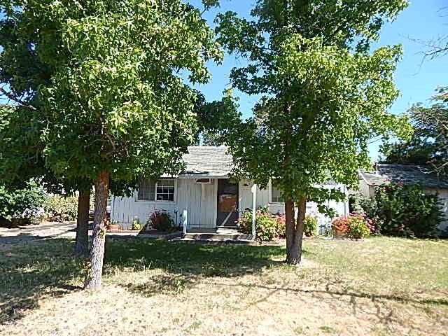 TWO REASONS TO REPAIR. You save money. You pick the decor. Lots of reasons to pick the quaint little 2-bedroom 1-bath with a building in the back that could possibly be turned into a secondary unit for family or a rental. Be sure to check the possibilities on this one! It's close to town, shopping and parks.