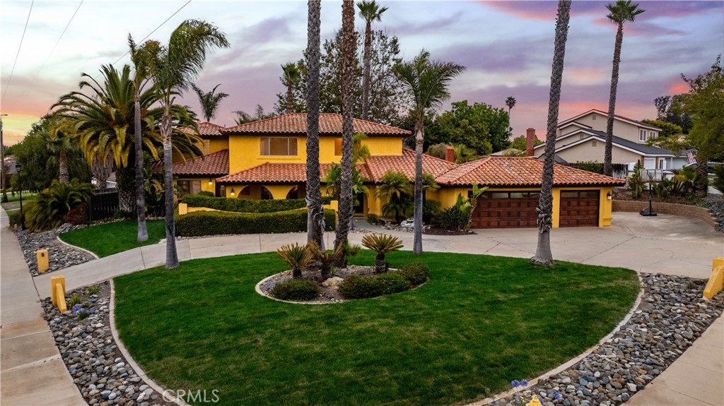 Your Spacious Elegance with Income Potential in the Heart of Orcutt is waiting for you. Nestled on a prime corner lot in the desirable Foxenwood Estates community, this beautifully updated 5-bedroom, 4-bathroom home offers the perfect blend of comfort, flexibility, and modern style. Spanning over 3,400 square feet, the property is designed to accommodate a variety of lifestyles, from multi-generational living to those seeking rental income through the fully self-contained granny unit with private entrance. The Granny unit provides its own kitchen, living room, bedroom and side door access with a nice and private patio space. Stepping inside the grand home, you find a completely remodeled kitchen, freshly installed flooring, paired with fresh paint that gives the home a crisp, clean feel. The floor plan includes formal living and dining rooms, a welcoming den with fireplace and wet bar, and a light-filled kitchen with breakfast nook, perfect for daily living and entertaining alike. The spacious layout flows seamlessly and offers privacy where it counts. The large primary suite is a true retreat, complete with a spa-inspired bathroom featuring a soaking tub, separate shower, dual vanities, and two oversized walk-in closet. The spectacular home provides four spacious rooms and the attached 1-bed, 1-bath guest unit offering endless flexibility for guests, extended family, or potential rental income. The main floor consists of a large guest room and the guest suite while the upstairs has two bedrooms and the primary retreat with its own walk out Romeo and Juliet balcony. Outside, the property boasts a beautifully landscaped yard, a circular driveway, and a spacious 3-car garage. Enjoy your own backyard oasis with a tranquil jacuzzi and waterfall feature, the perfect setting for relaxation or hosting friends and family. Residents of Foxenwood Estates can enjoy access to a private clubhouse with pool, tennis and pickle ball courts, fitness center, and more with a low membership fee. Located just minutes from top-rated schools, parks, shopping, and the charming Orcutt Old Town area, this home checks every box for location, lifestyle, and long-term value. Don't miss your chance to own this one-of-a-kind property in one of Orcutt’s most sought-after neighborhoods. Schedule your private tour today!