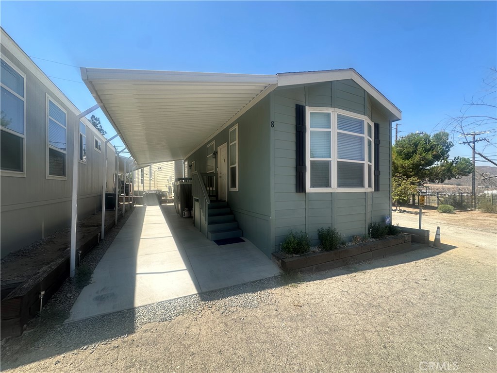 Welcome to 22113 Grand Terrace rd. unit 8! This fantastic, manufactured home is located in the prime lot of the park with a panoramic view San Bernadino valley. Home is practically brand new and in fantastic condition. Community is fully gated, with 24-hour security camera covering every inch of the property. Priced to sell with all amenities this home can't be guaranteed for long so please call with any questions you may have.