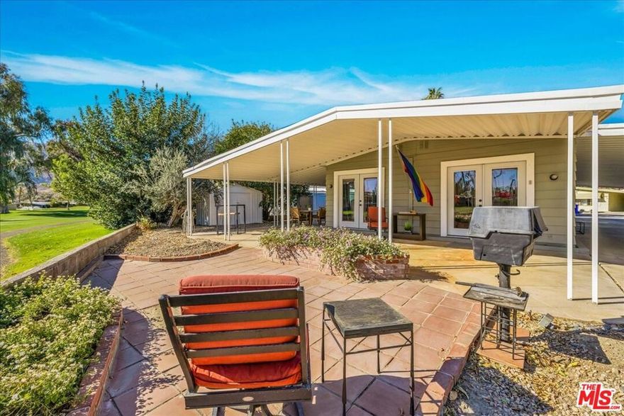 Introducing the most unique reimagining and repurposing of a mobile home interior you've ever seen! 441 Paseo Perdido has been completely remodeled and renovated by one of the Coachella Valley's most talented designers, Rick Metz. Offered turn-key and fully furnished, this one-of-a-kind property features a two bedroom / two bath primary residence AND an attached private casita / guest house / in-law suite - complete with it's own separate entry, kitchen, bath and laundry.  This brilliant use of space enables a homeowner to take on a "roommate" and offset monthly living expenses while still enjoying the privacy of their own residence.  Beautifully located on the golf course and across from a community pool, spa, sauna & gym, with views of the mountains, this home sits on a large corner lot and features plenty of yard & patio space, as well as a convenient, dual-entry driveway with covered parking for three vehicles, three utility sheds... Date Palm Country Club is THE premier 55+ MH golf community in Cathedral City.  Amenities and activities abound.  Schedule your tour today!