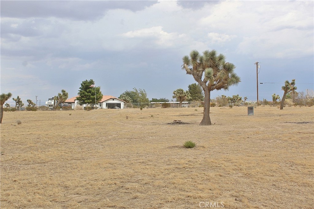 This 2.31 acre flat parcel offers the perfect canvas with wide space for your dream home, it has a water meter and electricity is available on the street. it is easy to find, is in front of in front of 12377 La Mirada Rd Phelan CA 92371. Only about 1000 feet from pavement on Duncan Rd and Wilson Ranch Rd, This piece of land is located in Phelan very close to Pinon Hills and boasts gorgeous mountains view and quiet rural setting with easy access to main roads, freeway and shopping venues. Established homes already in the area. Whether you are looking to build or hold for future potential, this property offers value and versatility in a growing area of San Bernardino County. The High Desert is now the future home of the recently approved High Speed Train from Apple Valley to Las Vegas and to the south to Rancho Cucamonga. The project is expected to break ground in the Victor Valley soon and be completed in over the course of the next few years, this projected is expected to bring in jobs and boost the economy of the High Desert.