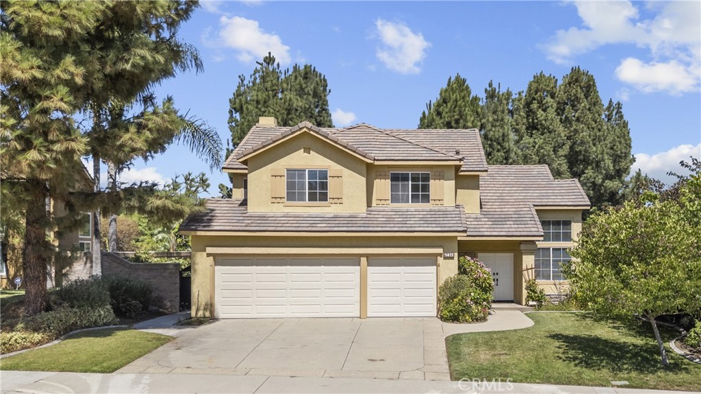 Exquisite Chino Hills 5-Bedroom Home on a Premier Street. Nestled on one of Chino Hills’ most sought-after streets, this recently updated 5-bedroom, 3-bathroom residence offers the perfect blend of elegance, comfort, and functionality—ideal for multi-generational living with a full downstairs bedroom and bath for guests or extended family. Upon entry, you are welcomed by luxurious marble tile flooring throughout the main level and soaring two-story ceilings in the formal living and dining rooms. Abundant natural light streams through expansive picture windows and upper-level windows, creating a bright and inviting ambiance. The recently remodeled chef’s kitchen is a showpiece, featuring a center island with storage, custom cabinetry with frosted glass uppers, sleek hardware, warm stacked-stone backsplash, matte black appliances, a white fireclay farmhouse sink, gooseneck faucet with filtered water dispenser, fluted floating shelves, recessed lighting, under-cabinet illumination, and a charming bay window. The kitchen seamlessly opens to the informal dining area and a cozy family room enhanced by a gas fireplace. The main level also includes a guest bedroom, full bathroom, and a well-appointed laundry room with wash basin, cabinetry, and ample storage. Upstairs, a spacious landing with additional storage leads to four bedrooms, including the luxurious primary suite. The oversized primary bedroom showcases a large picture window with serene backyard views framed by plantation shutters. The spa-inspired en suite bath features dual vanities, stylish lighting, a soaking tub, separate shower, private water closet, and a generous walk-in closet. Three additional bedrooms, all with updated mirrored closet doors, complete the second floor. Significant recent upgrades include a new TRANE central heating and air conditioning system and a newer water heater. A 3-car garage with direct access adds convenience. The expansive backyard is truly a highlight, offering custom concrete work, an elevated dining pad (ideal for a spa or pergola), mature trees, vibrant flowering plants, & an impressive array of fruit trees and plants including avocado, mango, guava, mandarin orange, navel orange, seedless lime, fuji apple, Asian pear, plumeria, blackberry, raspberry, blueberry, and more. Located just minutes from Ayala High School, Veterans Park, Community Park and The Shoppes at Chino Hills, this remarkable property combines luxury living with everyday convenience. WELCOME HOME