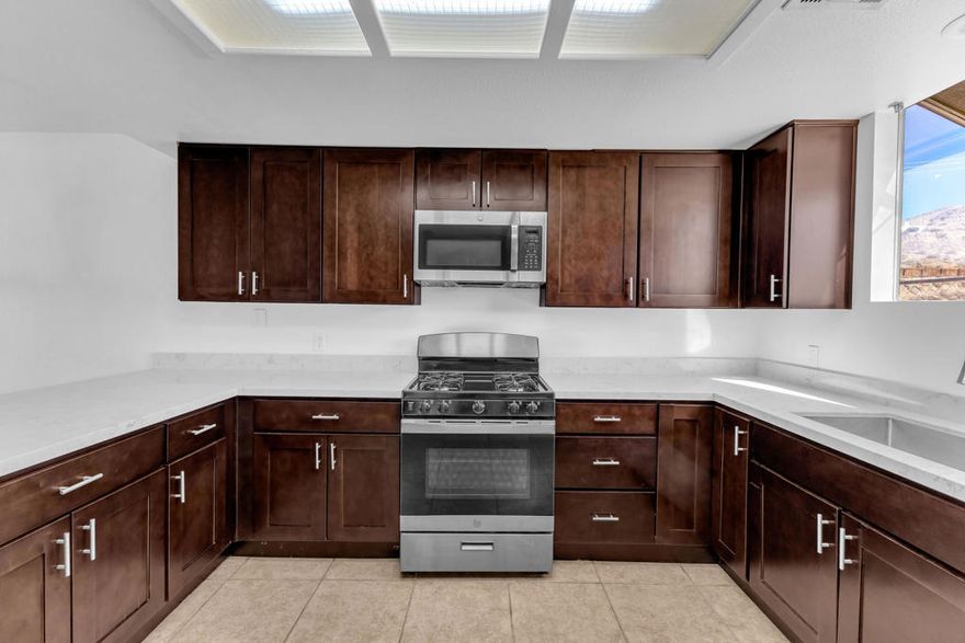 Desert Oasis with Panoramic Views & Modern Upgrades!Welcome to 12735 Avenida Alta Loma, a beautifully updated 3 bedroom, 2 bath residence nestled in the tranquil hills of Desert Hot Springs. Offering 1,624 sq. ft. of open living space on a generous 8,276 sq. ft. lot, this home captures the perfect balance of comfort, style, and sweeping desert mountain views.Step inside to a bright, airy living room centered around a charming stone fireplace, ideal for cozy evenings. The remodeled kitchen features sleek countertops, stainless steel appliances, and ample cabinet space. Designed for both everyday living and effortless entertaining. The primary suite includes a private, updated bathroom and a sliding glass door that opens to the backyard patio, inviting in natural light and stunning sunset views.Enjoy relaxing outdoors while soaking in the desert landscape. Additional highlights include a two-car attached garage, newer paint and a leased solar system for energy efficiency.Situated on a quiet street with no HOA, this home offers peaceful living just minutes from local spas, golf, shopping, and all the amenities of the Coachella Valley. Whether you're seeking a primary residence, investment, or vacation retreat, 12735 Avenida Alta Loma delivers comfort, charm, and value in equal measure.