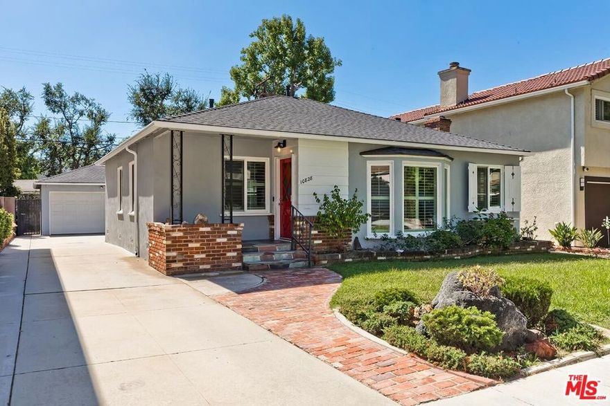 Gorgeous remodeled 3-bedroom, 2-bathroom home in Culver City's highly sought-after Lower Crest neighborhood! This bright and inviting home features a spacious living room with beautiful luxury vinyl floors, recessed lighting, and a large picture window overlooking the quiet tree-lined street. The gourmet kitchen offers white shaker cabinets, quartz countertops, and professional-grade stainless steel appliances. Both bathrooms are stylishly remodeled with marble-style quartz tile, including the primary suite's elegant en-suite bath. Additional highlights include a laundry room with washer and dryer, central air and heat, newer roof, and updated systems throughout. The detached garage is perfect for storage or a home gym, and the large backyard with mature landscaping and a generous patio, ideal for barbecues and outdoor entertaining. Fantastic location near Blanco Park, El Rincon Elementary, and just blocks from Pavilion's, Target, and not far to everything in Playa Vista and downtown Culver City!