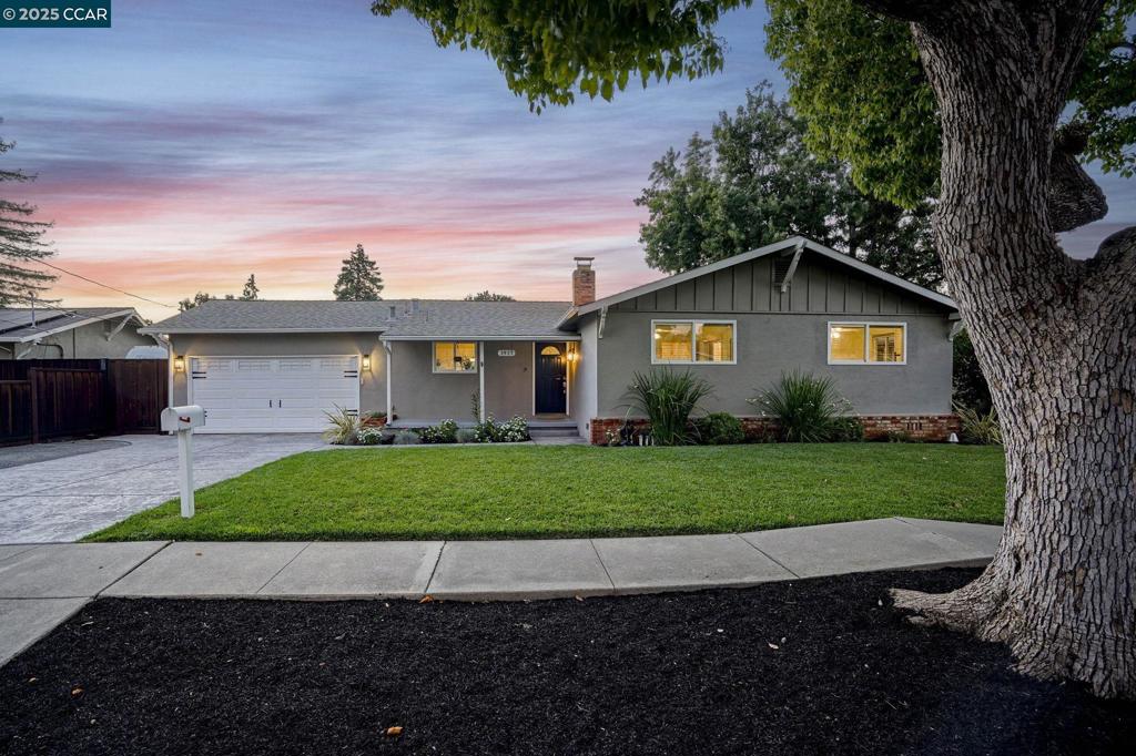This beautiful single-family home in the wonderful Dana Estates neighborhood blends modern finishes and stylish upgrades. You’re instantly greeted with a spacious front porch; perfect for relaxing and decorating! Inside, the open-concept layout flows effortlessly from the kitchen to the dining area and living room, creating an ideal space for both entertaining and everyday living. The kitchen features stainless steel appliances, a spacious island, and ample cabinetry. A glass slider off the dining area leads to the backyard, extending the living space outdoors. The primary suite is a peaceful retreat, offering private access to the backyard through its own glass slider and a private deck, along with an ensuite bathroom. Guests can enjoy the updated hallway bathroom, and two additional bedrooms provide flexible living options. The finished garage includes epoxy flooring with attic access, adding storage and functionality. Backyard has been tastefully updated with a playground area, a dog run, and a covered patio with built-in fans. Perfect for relaxing or entertaining! Additional highlights include brand new Shaw carpet in all bedrooms, a brand new sewer line, a built-in sound system in the living room, a Nest thermostat, and a Rachio smart sprinkler system. Don’t miss out!