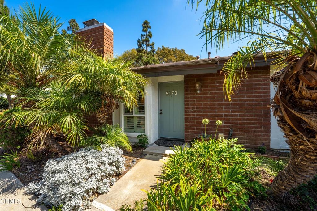 Single story unit located in a secure gated complex. No units above or below you here, 2 bedrooms, 2 bathrooms, gorgeous wood floors, dual pane windows, shutters, nice sized patio, 2 car detached garage, laundry room inside the unit, and a beautiful fireplace. Complex has two pool areas with recently remodeled bathroom / changing areas, unit backs to a nice green park inside the complex with Marion Park also close by. Easy access to shopping, restaurants and freeways. Priced to sell, come take a look! Washer / dryer and refrigerator are included. This is a PUD - good to go on FHA and VA loans!