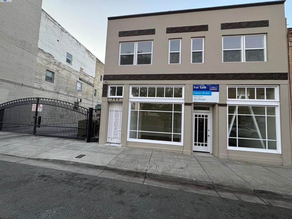 Newly remodeled top to bottom building with potential live/work opportunity. (Buyer to verify with City). First floor office space has building window signage, visitor entry, open work area, 2 offices, guest half bath, break room. Second floor residential has separate private entrance adjacent to the office entrance. Upstairs features 4 bedrooms, living room, laundry room, full bath plus half bath, kitchen with stone counters, cabinets, sink. Street parking and City parking lot across the street with free parking. 1st and 2nd floor separately metered. Great owner/user opportunity for live/work use. Or lease a portion of the building for office and live in the other portion, or vice versa. Or lease entire building as income property. Lots of possibilities. Full building alarm system.