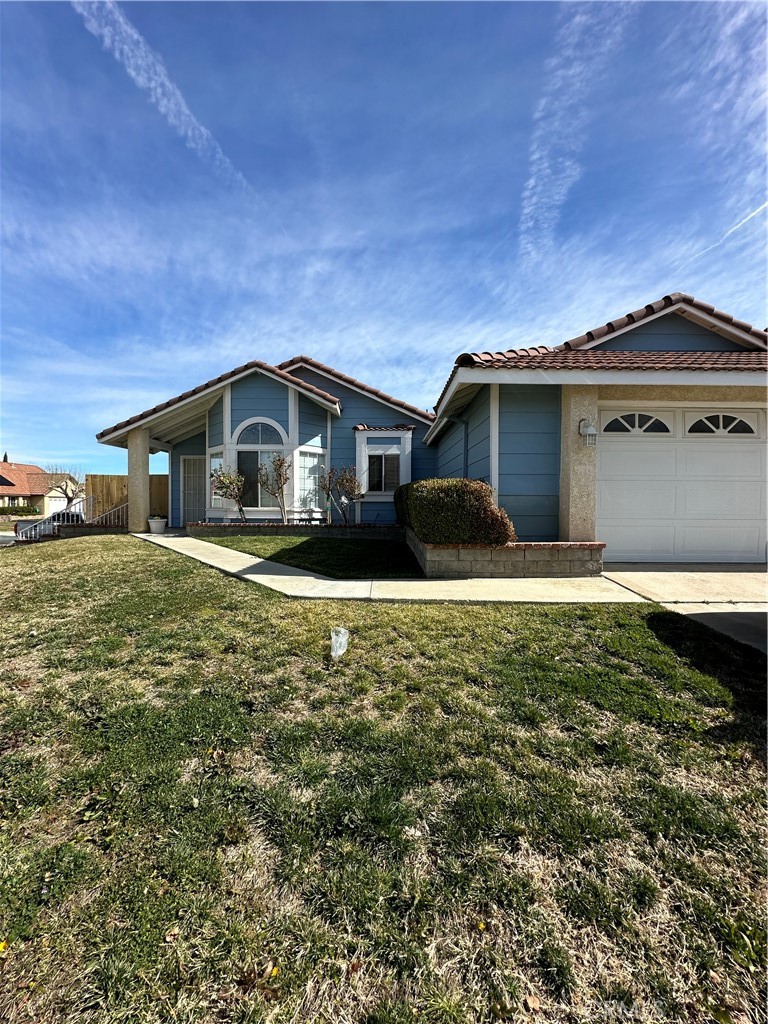 A perfect first-time buyer home located on a corner street in a wonderful neighborhood in the city of Palmdale Ca. Front yard offers a low maintenance yard with a welcoming stairway to the entrance of the front house. As you walk into this beautiful family home you will notice a spacious living room area with burgundy tile floor that gives a harmony feel to the property. Each well sized bedrooms have a very clean wooden laminated floor. The gorgeous main bedroom has a clean carpet flooring with its own full bathroom and built in closet. Kitchen area has an open floor style with a fresh countertop area. Make this wonderful home yours today!!!