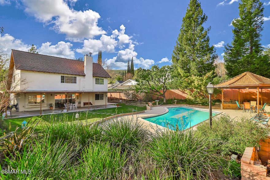 Calabasas - Pool Home with Downstairs Bedroom & BathExperience the ultimate in California living in this beautifully updated four-bedroom, three-bathroom pool home, perfectly situated in a prime Calabasas location. Freshly painted with plush new carpeting and modern recessed lighting, this residence effortlessly blends contemporary style with comfort.The spacious family room flows into an upstairs game room--ideal for a home office, media space, or play area. Step outside to your private backyard oasis, complete with a sparkling heated pool, elegant gazebo, and a large flat private yard, perfect for entertaining or tranquil weekend relaxation.Designed for today's active lifestyle, the home includes a three-car garage and quick access to nearby hiking trails, all just under 10 miles from Malibu Beach. Enjoy serene mountain views and the seamless harmony of indoor-outdoor living.Located within the prestigious Las Virgenes School District, this home boasts generously sized bedrooms, newer dual-pane windows, and updated AC and heating systems for energy efficiency and comfort. The inviting living room opens to an expansive covered patio, ideal for entertaining guests or enjoying quiet evenings under the stars.