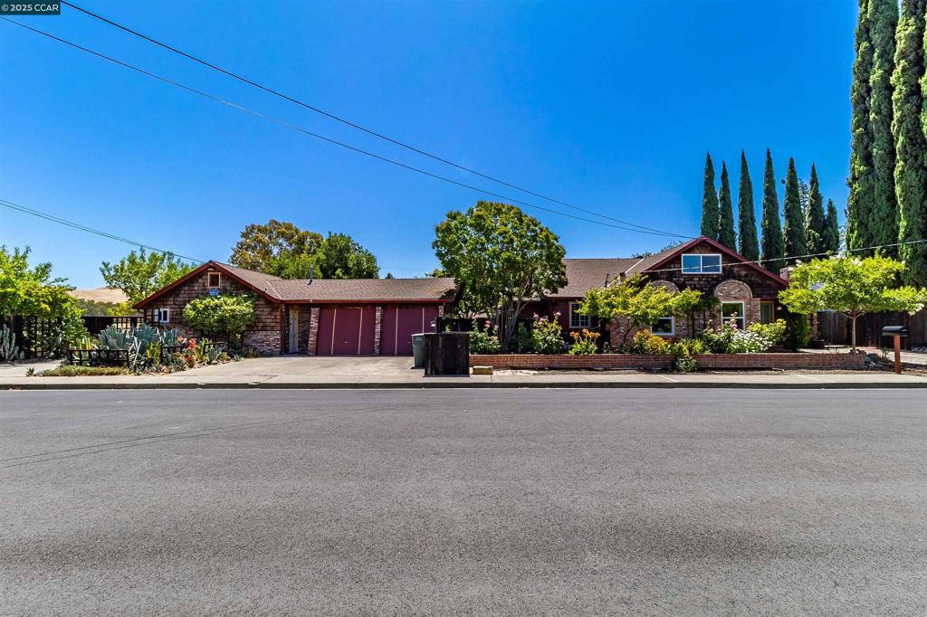 First time on the market in 60 years! Discover an incredible opportunity with a detached ADU in the heart of Concord, CA. Whether you're searching for your dream home location, building generational wealth, or eyeing your next investment opportunity, this versatile property checks all the boxes. The 2,586 sq ft main home offers 4 bedrooms and 4 bathrooms, featuring a spacious primary suite with private patio and a separate mother-in-law suite complete with its own bath and kitchenette. In addition there is a fully detached 352 sq ft ADU studio that includes a loft, full bath, and single-wall kitchen with island perfect for rental income, multigenerational living, or a savvy house hack. Sitting on a flat, .30-acre lot with a 2-car garage carport and a massive backyard, the potential is endless! Explore adding a pool, doing an ADU expansion, creating a garden oasis, or even examine the potential of a lot split. Located near beautiful parks, Todos Santos Plaza, BART, Lime Ridge trails, and freeway access in the highly desirable Crestwood area. A rare blend of space, location, and future upside - don’t miss your chance to make this property your dream oasis!