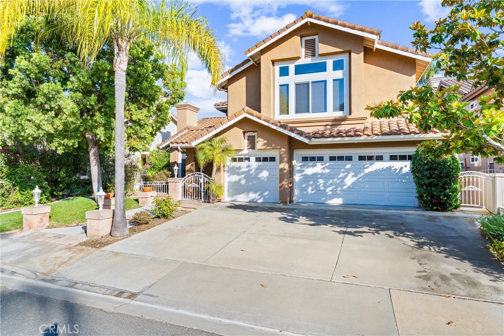 Welcome to 27088 Ironwood Drive, where breathtaking panoramic city views stretch across Southern Orange County. Situated in the highly sought-after Moulton Ranch community, this stunning home has been beautifully remodeled from top to bottom with style and function in mind.
Upon entry, you’re greeted by soaring two-story ceilings and a dramatic staircase that sets the tone for the open and airy layout. The light-filled formal living room, complete with a cozy fireplace, seamlessly flows into the elegant dining area with access to the backyard—perfect for indoor-outdoor entertaining.
The chef-inspired kitchen features quartz countertops, crisp white cabinetry, a center island, and premium appliances. It opens effortlessly into the inviting family room with a second fireplace. A built-in bar tucked beneath the staircase adds an extra layer of charm and convenience. A downstairs bedroom with its own full bathroom is ideal for guests or a private office.
Upstairs, the spacious primary suite offers a third fireplace, sweeping views, and dual closets with built-in cabinetry. The en-suite bath is a luxurious retreat, featuring an oversized walk-in shower and spa-like finishes. An expansive bonus room provides endless flexibility—perfect for a media room, playroom, home gym, or studio. Two additional bright and spacious bedrooms share an upgraded secondary bathroom.
Enjoy newer flooring, newer paint throughout, PEX repiping, paid-off solar panel systems, Tesla charging station and many more upgrades that enhance both comfort and peace of mind. Located near top-rated schools and with easy access to freeways, restaurants, shopping, hiking and biking trails, parks, and beaches, this home offers both convenience and lifestyle.
No Mello-Roos, Low Tax Rate, and Low HOA dues.
This home truly has it all—don’t miss your opportunity to own a piece of Southern California luxury with unbeatable views!