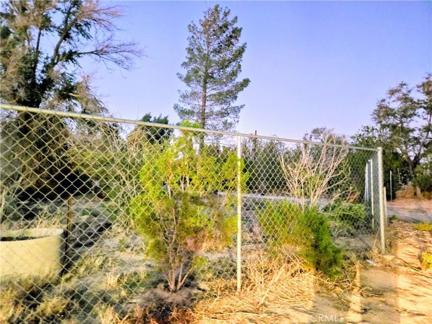 PLEASE DRIVE-BY ONLY!  This Land is located in residential area, only 3 minutes from Hwy 18,  25 minutes from Big Bear mountains. 20 minutes from Johnson Valley where you can ride your off road vehicles!