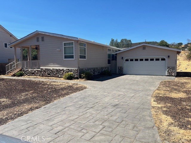 Country living, 1793 sq.ft. manufactured home plus 528 sq.ft. garage, open kitchen and family room, new appliances, breakfast bar, walk in pantry, lots of cabinets, formal dining, den/office or 3red bdrm. Master bdrm. with walk-in closet, master bath with separate tub and shower, dual sinks, mirrored closet doors, newer roof, all on 1/3 acre parcel, Spring Valley location close to 200 acre campground/Cache Creek.