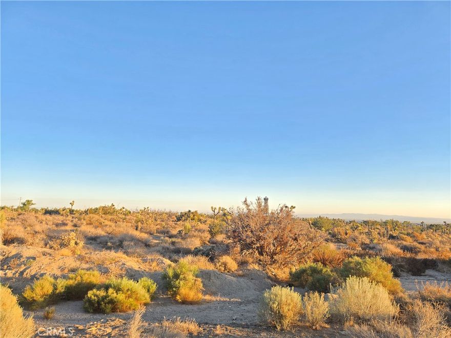 5.67 acres / 247,066 of commercially zone land, located adjacent to the intersection of Sheep Creek and Nielson Rd.  approximately 330 feet of street frontage along Nielson Rd.  Zoned for Industrial , Special (IC) PH/CG (buyer to verify) a wide range of possible uses for this lot.  Water on site, electrical near by, includes water share. Buyer and buyer's agent to verify lot size, zoning and allowable uses.