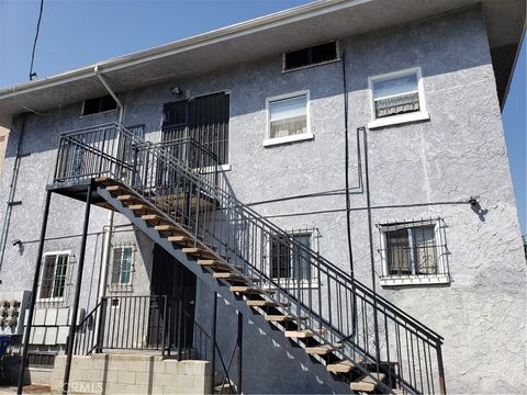 Photo of 1938 Bonsallo Avenue, Los Angeles, CA 90007 (MLS # PW25153349)