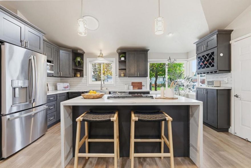 Welcome to this beautifully updated 3-bedroom, 2-full bath residence tucked within the serene Dana Estates neighborhood of Concord. Designed for both style and comfort, this home boasts a bright open-concept layout featuring a chef-inspired kitchen with elegant stone countertops, a generous island, and premium stainless-steel appliances  perfect for entertaining in effortless sophistication.  The expansive primary suite provides a spa-like retreat with a luxurious ensuite bathroom showcasing double sinks, an oversized soaking tub, a separate walk-in shower, the walk-in closet and abundant natural light. Enjoy the sliding doors leading to your tranquil redwood-lined backyard oasis  an idyllic escape from the everyday.  The spacious backyard offers endless potential, including the opportunity relax, garden, or explore the potential to add an ADU for extra income or multigenerational living. Energy-efficient solar panels ensure sustainable living without compromising on comfort.  Ideally located within walking distance to Starbucks, gyms, restaurants, and Concord High School, and moments from the community pool and garden, this home harmonizes modern luxury, convenience, and California tranquility.