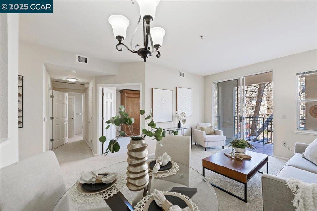 Welcome to this beautifully appointed Middleton model located at 1860 Tice Creek Dr #1249. This charming residence offers a perfect blend of comfort and convenience, boasting 860 square feet of thoughtfully designed living space. Step inside to discover a bright and airy interior featuring two bedrooms + two pristine bathrooms, providing ample space for relaxation and privacy. The open-concept layout seamlessly connects the living area, dining space, outdoor deck, and kitchen, creating an inviting atmosphere ideal for both entertaining & everyday living. The well-equipped kitchen is a culinary delight, featuring modern appliances and ample cabinetry, making meal preparation a breeze. The adjacent living area is bathed in natural light, providing a warm and welcoming ambiance. Enjoy the convenience of having a total of five rooms, offering versatility and additional space for your personal needs. Whether you choose to set up a home office, a cozy reading nook, or a creative studio, the possibilities are endless. There's even a Murphy bed for your guests. Located in a vibrant community with access to various amenities, this condo offers a lifestyle of ease and enjoyment. Explore nearby shopping, dining, and recreational opportunities that cater to diverse interests and preferences.