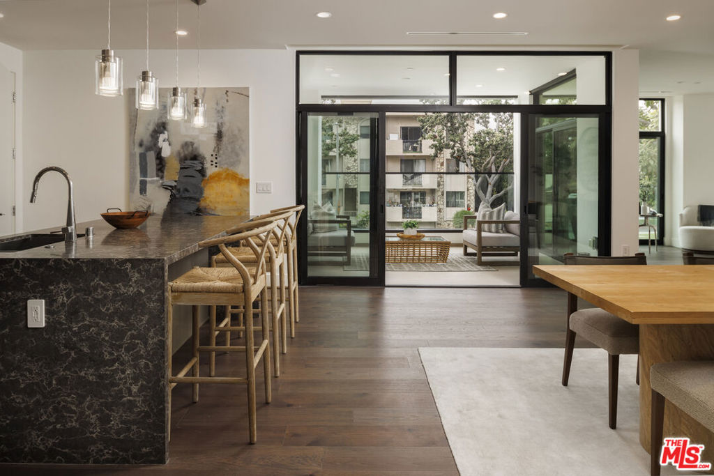 Welcome to 425 Palm in Beverly Hills. Enter Residence 201 through your direct access elevator into a private foyer. This spacious 3-bedroom, 3.5-bathroom floor plan with 3,379 interior SF and 145 exterior SF features a seamless open-concept design, flowing effortlessly from the gourmet kitchen to the dedicated dining and living rooms. Impeccable interior finishes include Wolf and Sub-Zero appliances, a Miele built-in coffee system, Caesarstone countertops in the kitchen and bathrooms, Italian Gessi fixtures, and custom imported Linea Quattro European cabinetry. The residence also provides three side-by-side assigned parking spaces. 425 Palm offers an on-site fitness center with top-of-the-line equipment, an outdoor gourmet kitchen, a sunken spa, a dedicated lobby with 24-hour on-site staff, controlled access, and subterranean side-by-side parking.