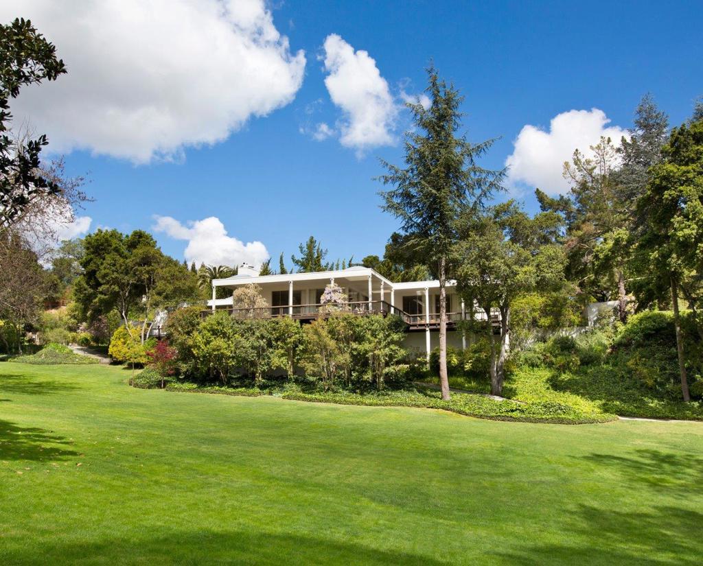 COMPRISED OF 2 PARCELS ( APN 073-202-730 ..3.37acres and APN 073-202-600..2 acres) FOR A TOTAL OF 5.37 ACRES THIS CONTEMPORARY HOME DESIGNED BY JOSEPH ESHERICK SITS PRIVATELY ON A KNOLL-TOP AT THE END OF BELBROOK. TRULY A ONE-OF-A KIND PROPERTY. LIVING ROOM AND ATRIUM WITH 13 FT CEILINGS, WALLS OF GLASS DOORS AND WINDOWS. A WRAP AROUND DECK THAT OVERLOOKS VISTAS OF THE WESTERN HILLS......TERRACE WITH POOL, 2-BD GUESTHOUSE. LAS LOMITAS SCHOOLS