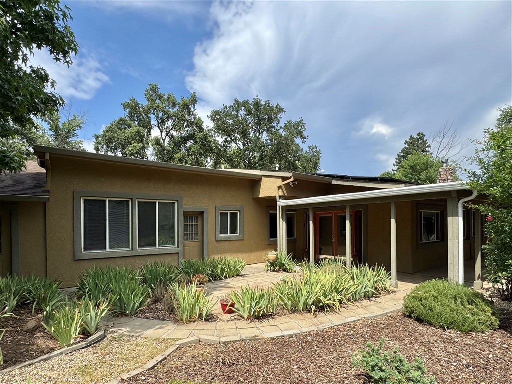Secluded 5-Bedroom Home on Cul-de-Sac Lot in Central Chico
Tucked at the end of a quiet cul-de-sac, this spacious 5 bed, 3 bath home offers 3,212 sq ft of living space on over half an acre (28,314 sq ft lot). Built in 1948, the property combines vintage charm with endless potential and plenty of room to add a pool, shop, or ADU.
Inside, you'll find a generous layout with a private primary suite and a unique rock room that adds character you won’t find anywhere else. Whether you’re entertaining or relaxing, the multiple living spaces offer flexibility and comfort. An owned solar system and an oversized 3-car garage offers ample storage a workshop space.
The outside features a large garden area, a variety of fruit- and nut-bearing trees: 3 mulberries, 2 nectarines, 2 Asian pears, 2 miniature oranges, 2 apricots (one grafted with peach), 2 navel oranges, 2 blood oranges, 2 pluots, 2 pomegranates, 1 almond, 1 black walnut, and 1 pecan.
Enjoy a peaceful setting while staying close to shopping, schools, and restaurants. With both space and convenience, this property is a rare find in the heart of Chico.