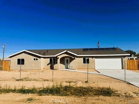 Photo of 8669 S. Loop Boulevard, California City, CA 93505 (MLS # DW26203736)