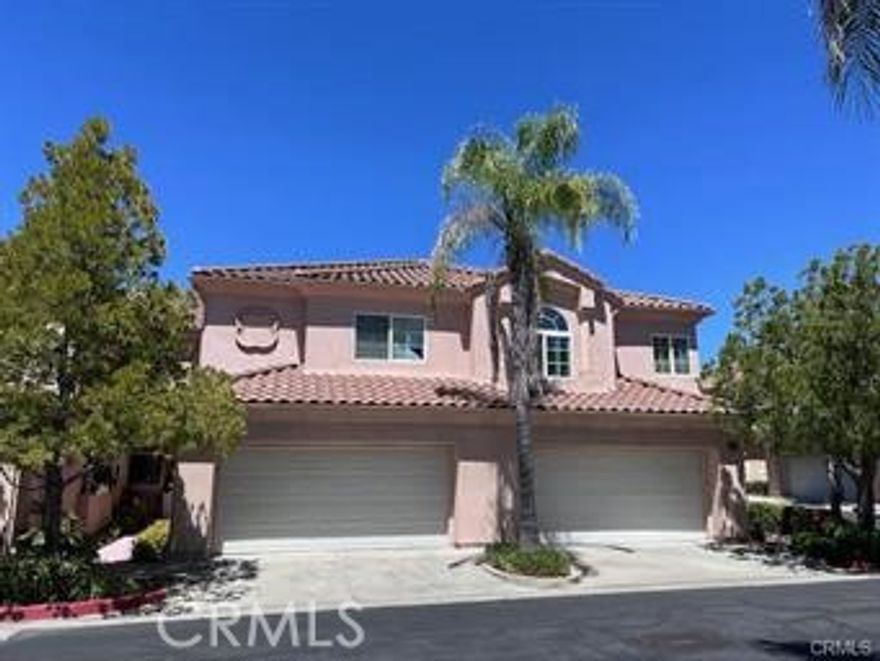 Nestled in the prestigious Rancho Bahamas community of Temecula, 41870 Saint Thomas Court, Temecula. This stunning luxury townhouse boasts an inviting, open, and bright floor plan. As you step through the mahogany front door with leaded glass, the attention to detail becomes apparent. Tile flooring enhances the dining and living room areas, creating an elegant ambiance, carpet throughout the 2nd floor. The spacious kitchen features granite counters, high-quality appliances, with cherry-colored cabinets, offering both style and functionality. The dining area overlooks the inviting backyard, complemented by baseboards and a striking dual fireplace shared between the living room and dining room. Upstairs, three large bedrooms and 3.5 bathrooms. The master bath includes a large tub, separate shower, dual sinks, and a vanity area, evoking a spa-like experience. Additionally, the walk-in closet ensures ample storage. This townhouse provides a private and fenced backyard, adding to the overall appeal of this exceptional property in the desirable Rancho Bahamas community, With 1,862 sqft of living space, this large townhome is Centrally located in the heart of the city, it provides easy access to the mall, schools, restaurants, and shops.