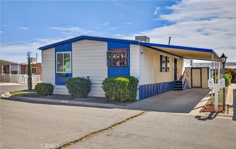 Photo of 13393 Mariposa Road #78, Victorville, CA 92392 (MLS # IV26099087)