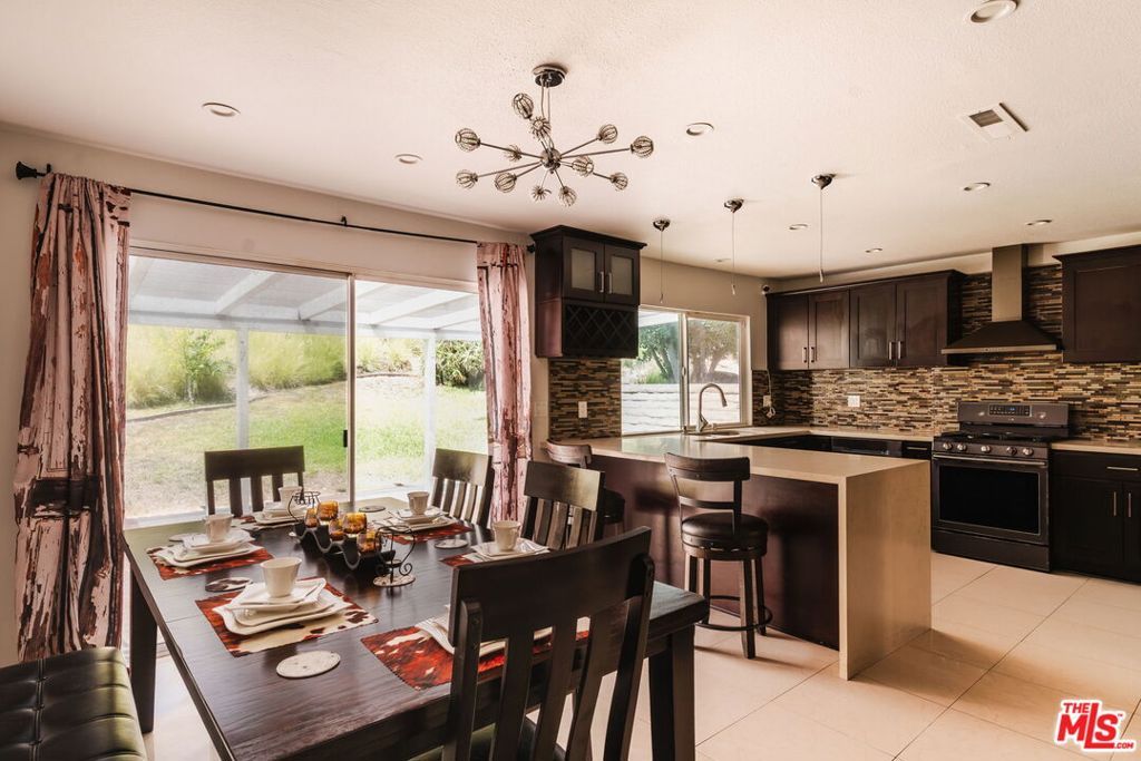 Photo of 19121 Kenya Street, Porter Ranch, CA 91326 (MLS # 25562433)