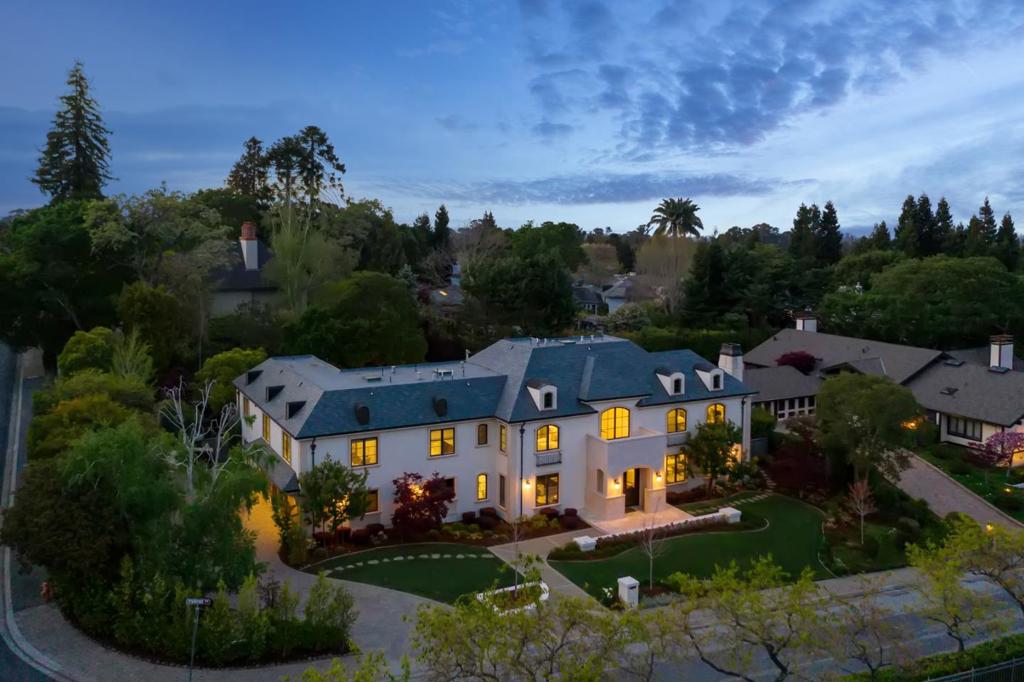 In Lower North Hillsborough, this modern French Chateau-style residence was extensively updated in 2015. The two-level home with elevator accommodates work from home and distance learning needs as well as for fitness, recreation and outdoor enjoyment with a large lawn for play, pool, spa, outdoor kitchen and dining deck. A dramatic two-story entry reveals espresso-colored oak floors, refined millwork, exquisite finishes, detailed tray ceilings and glass doors at every turn for seamless transitions to outdoor living spaces. Formal living and dining areas are complemented by casual spaces, including a chefs kitchen with professional grade appliances, family room, media room and library, all with easy outdoor access. Three of the 6 bedrooms are suites; two have luxe bathrooms, walk-in closets, and a fireplace or balcony. Located minutes from downtown Burlingame and San Mateo, top-rated Hillsborough schools and quick connections to international airports, San Francisco and Silicon Valley.