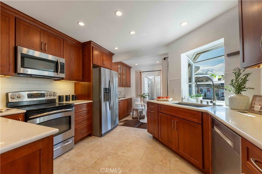 Photo of 22225 Caminito Zaragoza, Laguna Hills, CA 92653 (MLS # OC26004398)