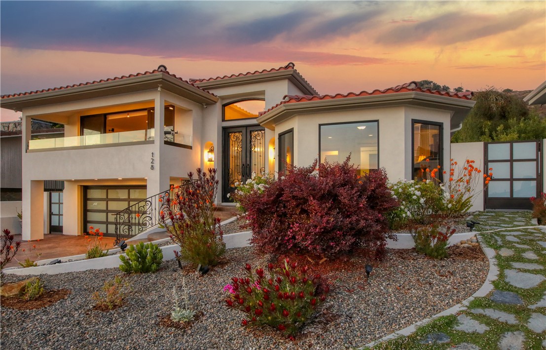 With its spectacular design and unmatched location, 128 Florin is a place to live beautifully, a unique property offering a lifestyle that truly epitomizes coastal elegance and timeless luxury. Ideally situated in the heart of Shell Beach, this magnificent residence redefines ultraluxury living, gracious entertaining, and a plan for personal privacy that assures peace of mind with amenities that provide the perfect coastal lifestyle. From the panoramic shimmering ocean and Avila bay views to the meticulously designed interior, every detail seems crafted to create a haven of comfort and tranquility. An extraordinary expression of custom features and the finest materials grace the 2 bedroom, 3 bathroom masterpiece. Completely reimagined in 2019, with additions, upgrades and improvements including stunning finishes, a state-of-the-art kitchen that caters to every culinary desire, impressive floor to ceiling glass doors seamlessly merging indoor and outdoor living spaces, and two primary bedrooms each with its own luxurious en-suite bath. The well-proportioned living room, dining area and kitchen offer sea views and invigorating ocean breezes with wonderful indoor-outdoor living throughout. A sprawling paradise of relaxation and amenities including a spa, 3-hole putting green, table and chairs with firepit, dedicated BBQ area, and impressive terraced backdrop, complete the picturesque backyard oasis. For discerning homeowners seeking a standard of excellence in coastal living, this is a rare opportunity to acquire a crown jewel in the highly sought after Shell Beach community.
