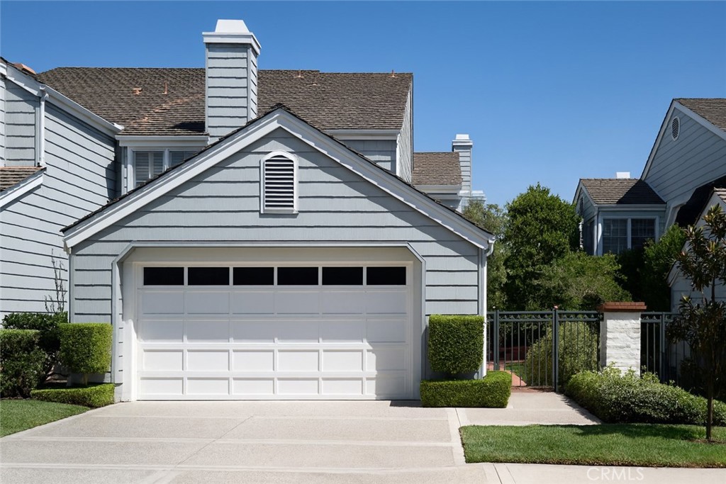 Experience refined living in the prestigious guard-gated enclave of Belcourt Terrace. This beautifully maintained residence spans nearly 2,990 square feet, offering three bedrooms and two-and-a-half baths. Perfectly versatile, it serves as a move-in ready retreat or the foundation for a fresh new vision. With new exterior siding underway, the home is ready to welcome its next chapter.
Designed with both comfort and elegance in mind, the floor plan features generous formal living and dining rooms, a light-filled kitchen, and a welcoming family room—spaces that transition effortlessly from daily living to entertaining. Expansive windows and French doors flood the interiors with natural light while opening to serene patios and gardens, embodying Newport Beach’s quintessential indoor-outdoor lifestyle.
The primary suite is a private sanctuary, complete with a home library and storage, a walk-in closet, and peaceful views of the community’s greenery. The en-suite bath is bright and airy, while two additional bedrooms provide exceptional scale and flexibility for guests, family, or a home office.
Belcourt Terrace has recently undergone a community-wide refresh, highlighted by lush landscaping, a tranquil ambiance, and resort-style amenities including a pool, spa, and clubhouse. With 24-hour guard-gated security and a premier location near Fashion Island, world-class dining, pristine beaches, John Wayne Airport, and top-rated schools, 81 Hillsdale Drive offers not only a distinguished address but also an unrivaled lifestyle in the heart of Newport Beach.
