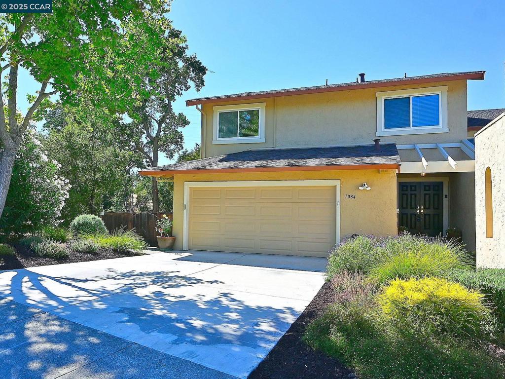Open Sat/Sun 2-4PM! Spacious 2,000+ SF updated Townhome at the end of a cul-de-sac in South Walnut Creek! Located in the Oak Creek community of Rudgear Estates. Recently updated kitchen with white cabinetry, new SS Appliances, Quartz counters with tons of counterspace & storage! The living & dining room are combined and feature soaring vaulted ceilings, fireplace and patio door to the backyard. The large family room has a patio door to the sideyard that overlooks the open space. The primary bedroom has a double door entry, slider to private deck and a full bathroom. There are 2 additional large bedrooms and a full bathroom. Features include dual pane windows, Central a/c, whole house fan, new carpet, laminated wood flooring, recessed LED lighting, skylights and 2 car garage with laundry. A member of Rudgear Estates community Swimming pool. Rudgear Park has Pickleball, Tennis, Soccer, Baseball, Basketball, playgrounds, walking/bike trails and more! Great commute location near downtown Alamo and Walnut Creek. Acalanes school district of Las Lomas Highschool & Walnut Creek schools.