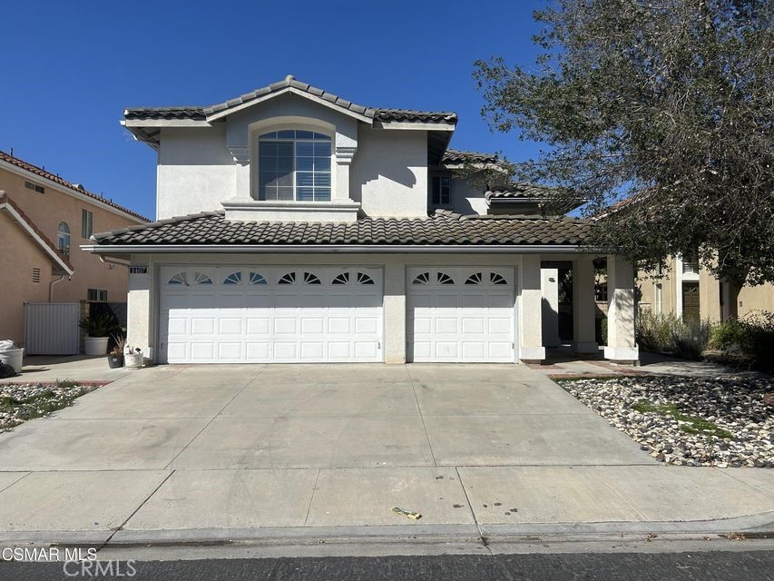 This spacious two-story home is nestled in a beautifully-maintained 24 hour guard gated Rancho Conejo community. At entry you are greeted by soaring ceilings and a wide-open floor plan adorned by numerous supersized windows which drink in bright, natural light. One bedroom is downstairs with a 3/4 fully bathroom. 3-car garage. Two community pools and a fabulous community park with a playground, baseball court, and picnic area, and close to several malls, restaurants, and easy freeway access.