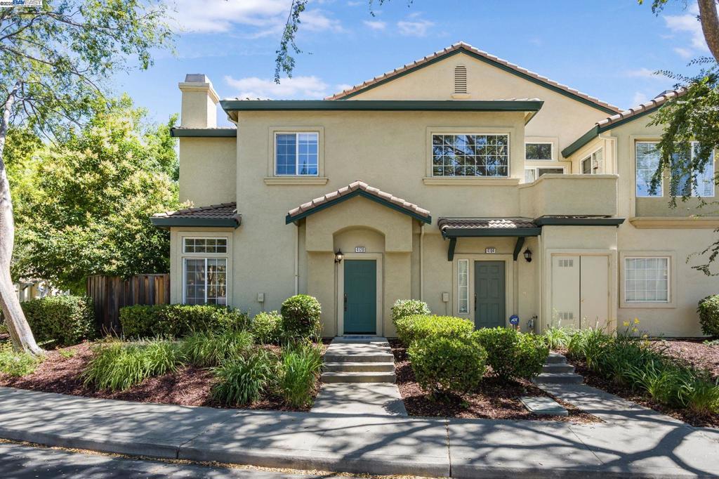 Bright & Beautifully Upgraded Corner Townhome in Prime Pleasanton! Fall in love with this 3BD/2.5BA, 1,503 sq ft home with a private backyard in the sought-after Sienna community, featuring over $37K in upgrades and a move-in ready design. A sunlit open floor plan welcomes you with fresh custom paint, brand-new luxury vinyl plank flooring downstairs, and plush custom carpet on the stairs and bedrooms for comfort and style. The modernized kitchen shines with white cabinetry, granite tile counters, a gas stove, refrigerator, dishwasher, and spacious pantry. Step outside to a backyard with pavers and rare open views, no rear neighbors, perfect for relaxing or hosting friends. Upstairs, the airy primary suite offers dual mirrored closets and a sleek double-sink vanity with upgraded lighting, while two additional bedrooms share a full bath with a shower/tub combo. A separate laundry room, side-by-side 2-car garage, and low HOA (with pool, spa, clubhouse, and picnic area) make life effortless. Close to BART, I-580/680, shopping, dining, and top-rated schools. This home is a must-see! Visit the open house before it’s gone!