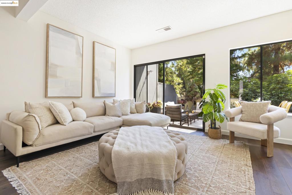 Rarely available and beautifully updated, this 3-bedroom, 2.5-bath end unit offers 1,332+/- square feet of elegant living space. With luxe vinyl flooring, updated bathrooms, a modernized kitchen featuring oak cabinets and granite counters, and spacious bedrooms. The property includes a 2-car garage plus an extra parking space and is conveniently located near Hayward Area Recreation and Park District Dog Park, San Lorenzo Community Park Outer Trail, Kennedy Park, shopping, dining, and transportation. Nestled in a well-managed community, residents enjoy both privacy and ease of access to neighborhood amenities, making this home the perfect blend of comfort and convenience.