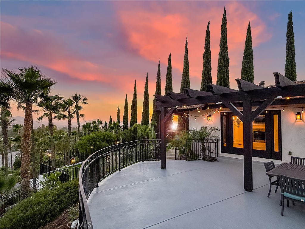 ONE OF A KIND Spanish Hacienda Villa with Panoramic Mountain & City Views! Custom European floor-plan and design nestled behind private gates & mature Mediterranean Landscape with Ultimate Privacy. Gourmet kitchen w/granite counters, SS appliances & walk-in pantry, open to dining area & living room w/custom fireplace. Three sets of custom French doors open up to dual patios overlooking lush grounds, rear yard, and breathtaking sunrises & sunsets. Spacious Primary w/his & hers closets, additional views, and a luxurious ensuite bath w/soaking tub, frame-less glass shower & dual sinks. Entertainer's space downstairs: Large Family Room w/FP, custom full-size wet bar, two sets of French doors to spacious rear yard. Two additional bedrooms downstairs w/private on-suite bathrooms. Car Enthusiast Dream Rare 4 car garage w light and bright /tandem garage complete w/ mechanic shop: in ground hydraulic lift, compressor, engine hoist, & built in steel cabinets. Custom windows, doors, smooth stucco, plumbing, HVAC and more! Zoned RE20: Bring your horses and chickens! Custom chicken coop and plenty of room to garden! Enjoy the farm to table! Fully fenced in acre! Centrally located and just steps away from mountain trails and minutes from fine dining, shopping 23/101 fwy and Conejo Valley Schools!