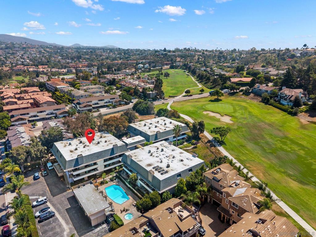 Welcome to this rare single-level, turn-key end unit in the heart of La Costa! Just minutes from the beach, this 2-bedroom home offers the space and function you’ve been looking for. The open-concept floor plan is filled with natural light thanks to eastern exposure and three sets of sliding doors that seamlessly connect the living room—anchored by a cozy wood-burning fireplace—to an expansive private patio, perfect for morning coffee and entertaining. The spacious primary suite features a large walk-in closet and an updated bathroom with tub & shower. The generous kitchen provides ample cabinet space, while the sunlit living areas create a warm and inviting atmosphere throughout. Enjoy two designated parking spaces, one dedicated garage spot and one exterior spot. Resort-style community amenities, including a pool, jacuzzi, and sauna. With boutique shops, Omni golf and tennis, top-rated schools, and restaurants just around the corner, you’ll have everything from beach walks to birdies right within reach.