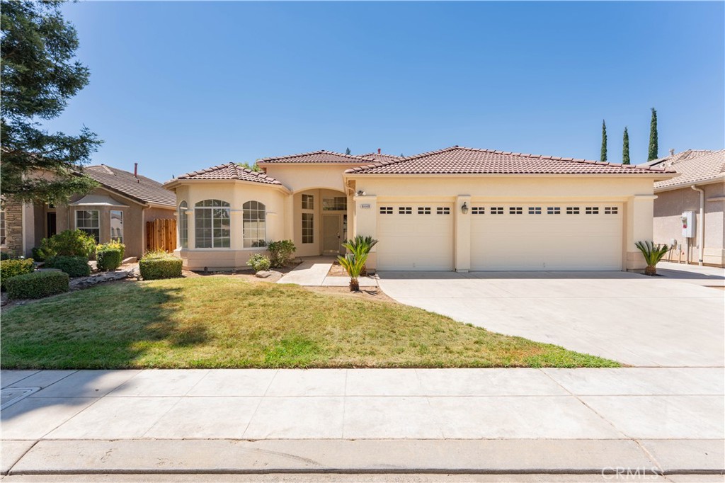 Beautiful Home in the Gated Sagewood Community and part of the award winning Clovis school district!
Welcome to this spacious and well-maintained home nestled in the highly sought-after gated Sagewood community. Boasting over 1,800 square feet of living space on a generous 7,300 square foot lot, this home offers comfort, style, and functionality. Step inside to an open floor plan with vaulted ceilings and an abundance of natural light. The oversized living room features a cozy fireplace, perfect for relaxing or entertaining. A separate dining/family room offers flexible living space to suit your needs. With three bedrooms and three bathrooms, including a large primary suite with an ensuite bath, there’s plenty of room for everyone. The private backyard provides a great space for outdoor enjoyment, while the attached three-car garage offers ample storage and parking. Conveniently located near parks, schools, shopping, and major freeways—this home truly has it all! The grass was added to the photos. The sprinkler system has been repaired.