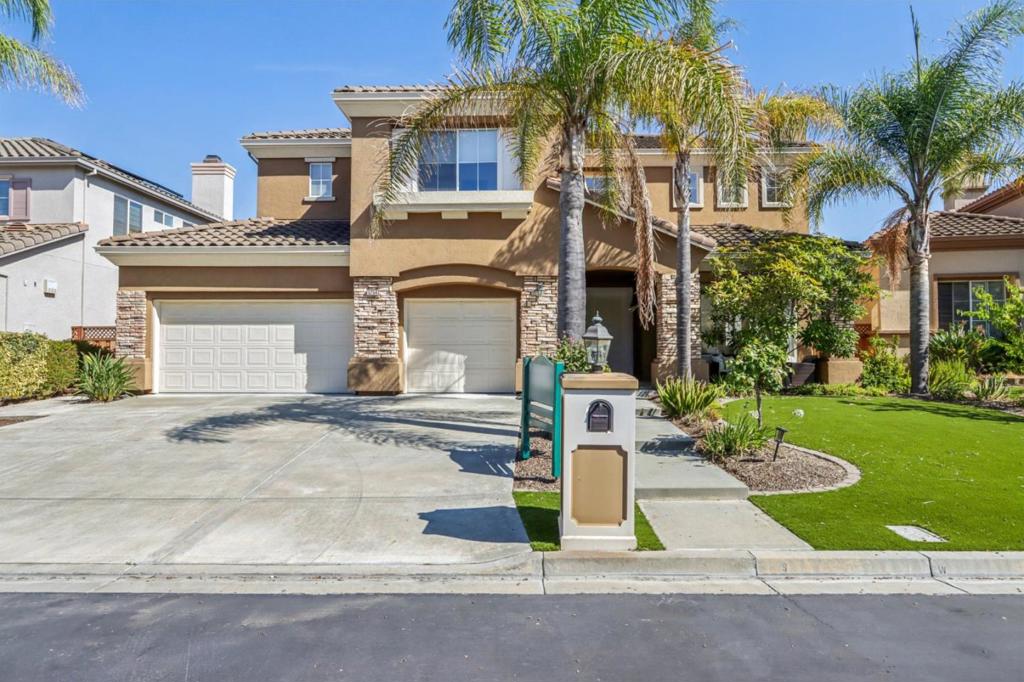 Welcome to 5254 Grosseto Court, tucked behind the gates of the Silver Creek Valley Country Club. Part of the Monterey Collection with its own private gate, this residence features one of the community's most desirable floor plans and enjoys mountain views. From the moment you enter, soaring ceilings, hardwood floors, and an open layout set the tone for elegance. Spanning 3,880 sq.ft on a 7,558 sq.ft. lot, this home offers 5 beds plus an office and 4.5 baths. The chefs kitchen is a true centerpiece, with a huge center island, stainless steel appliances, and refinished cabinets, flowing into the casual dining area and impressive super family room-designed for both family moments and larger gatherings. Upstairs, the primary suite is a private retreat with a spa-inspired bath, dual walk-in closets, and an office. A private balcony highlights beautiful mountain views, perfect for morning coffee or evening relaxation. Downstairs, an oversized ensuite bedroom stands out as one of the largest secondary suites inside the gates. Outdoors, the landscaped backyard is a serene oasis framed by mountain views and ideal for entertaining. Don't miss this rare opportunity to own a gem in Silver Creek Valley Country Club, with top-rated schools and its own private gate for quick freeway access.