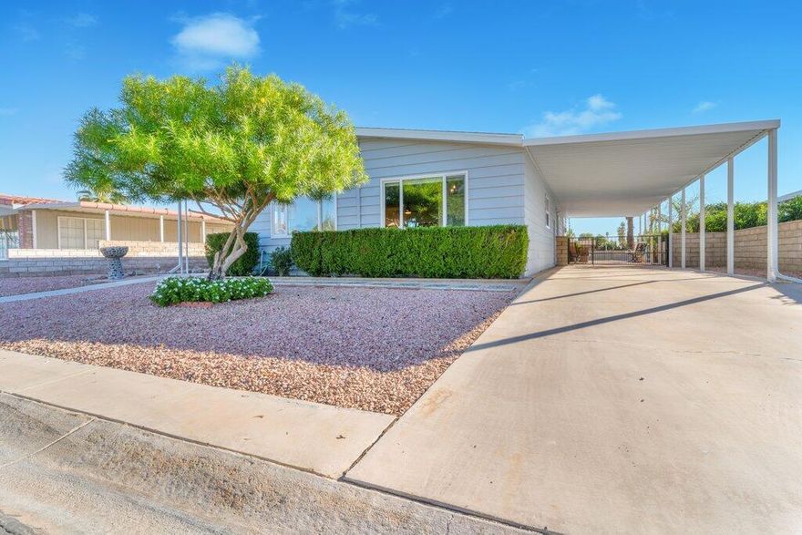 Discover exceptional value and comfort in this beautifully maintained 2-bedroom, 2-bath manufactured home in the highly desirable Portola Country Club, a gated 55+ golf community in the heart of Palm Desert -- where you own the land (no space rent!).Bright and inviting, the home offers open-concept living with newer dual-pane vinyl windows showcasing stunning mountain views, a newer water heater, a new ceiling and vinyl plank flooring in the air conditioned bonus room. Thoughtfully designed with two primary suites, each featuring its own ensuite bath, the layout provides both privacy and flexibility--ideal for hosting guests. In addition to central air and heating, an evaporative cooler enhances energy efficiency and year-round comfort.The bright and spacious kitchen includes a gas cooktop, stainless steel double oven, double stainless sink, and a built-in breakfast bar--perfect for your morning coffee or casual meals. The comfortable family room flows through French doors into a versatile bonus area, leading to a spacious hobby or craft room--tailored to your lifestyle.The home opens onto a large backyard with stunning mountain views, easily accessed from the rebuilt carport. This private outdoor space offers abundant room for a spa, barbecue, or garden, along with space for your four-legged companion and endless possibilities for relaxing or entertaining. The home is on a permanent foundation with recorded 433A for easy financing and peace of mind.Residents of Portola Country Club enjoy unlimited golf on the private 18-hole, par-3 course, included in the low HOA fee, which also covers trash, cable, and internet. The community features three pools, pickleball and bocce courts, a NEWLY REMODELED clubhouse and fitness center, pub, dog park, and a full calendar of social activities.Located close to El Paseo's premier shopping and dining, the McCallum Theatre, and Civic Center Park, this home offers the perfect combination of comfort, community, and resort-style living in a friendly and active environment.