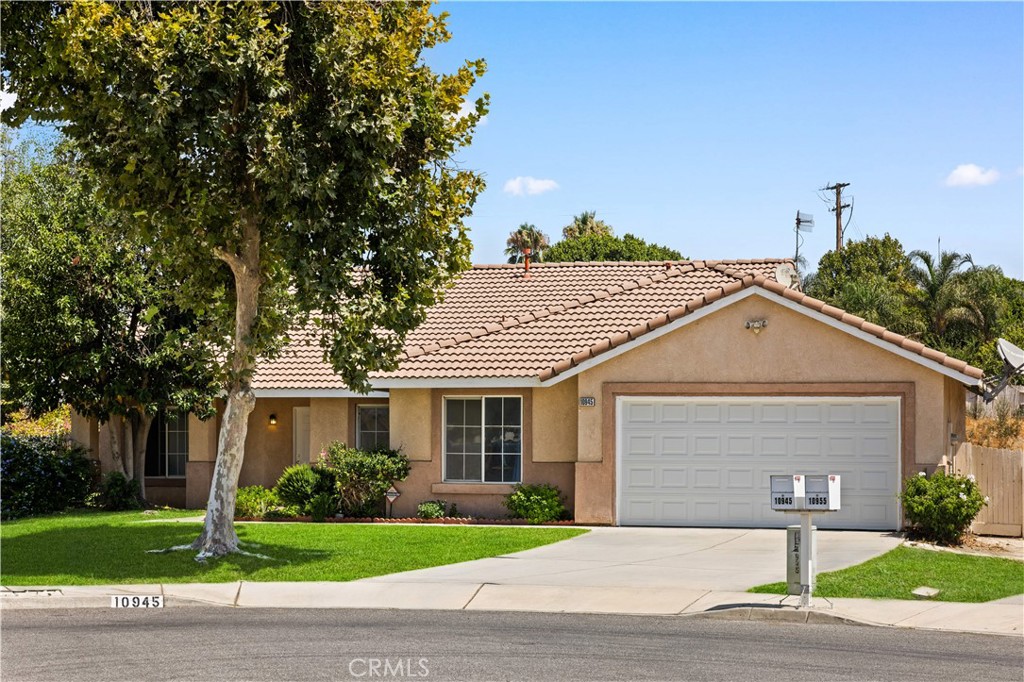 Discover your dream home on this serene one-story home, tucked away in a peaceful cul-de-sac on over 0.6 acres. This spacious residence features 5 bedrooms, 2 bathrooms, and a versatile 2,078 sq ft layout.
Upon entering, you’ll be greeted by an open and airy design with vaulted ceilings, abundant natural light, beautiful laminate flooring, and a fresh, inviting color palette.
The chef’s kitchen is highlighted by a quartz island—perfect for cooking and casual gatherings. Adjacent, the family room invites relaxation with an upgraded fireplace, ideal for cozy evenings.
Both bathrooms are thoughtfully designed with double sinks and a bathtub/shower combo, and the large master suite along with four well-sized bedrooms and convenient indoor laundry make daily living seamless.
Step through the sliding patio doors to your private backyard oasis, complete with mature fruit trees, colorful blooms, and a huge covered patio. With over 0.6 acres, the possibilities are endless—whether for relaxing, gardening, entertaining, or future expansion.
Move in and enjoy the perfect combination of comfort, space, and convenience, with easy access to the I-10 freeway, schools, and local amenities. Don’t miss this rare opportunity to make this exceptional home yours!
