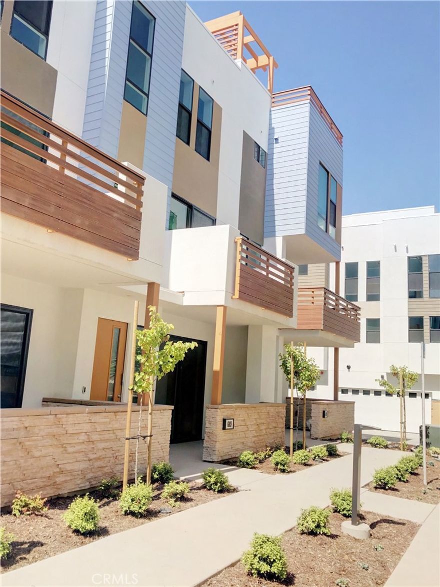 Experience the best of coastal living in the vibrant mixed-use community of 17 West, just about one mile from the beach! The first floor features a flexible office or studio space with a half bath, while the second floor offers a spacious, open-concept kitchen and living area—perfect for entertaining. Upstairs, you’ll find three comfortable bedrooms, including a primary suite with a walk-in closet and a beautifully upgraded bathroom.



This smart home includes modern features such as a Ring doorbell, Wi-Fi–controlled thermostat, and smart garage door opener. Additional highlights include an epoxy-coated garage floor and access to community amenities like BBQ areas, fire pits, seating spaces, and a play area for gatherings.



Conveniently located within walking distance to Trader Joe’s, Michael’s, and popular local shops, with easy access to top-rated Newport Mesa schools. Enjoy a stylish, low-maintenance lifestyle near the coast!