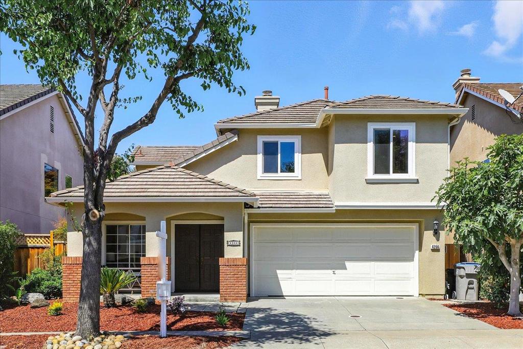 This impeccably-maintained single-family home is situated in the highly sought-after California Impressions community, with no HOA. Step inside to discover gleaming hardwood floors, soaring ceilings, and abundant natural light throughout. The inviting living and dining areas lead to a spacious family room anchored by a cozy fireplace and entertainment niche, perfect for relaxing or entertaining. The remodeled kitchen boasts brand-new quartz countertops, ample cabinetry, stainless appliances and overlooks the family room. Upstairs, retreat to the oversized primary suite with a large walk-in closet and a luxurious en-suite bathroom featuring a double vanity, soaking tub, and separate shower-a true spa-like escape. Two additional bedrooms and a full hallway bath complete the upper level. Enjoy outdoor living in the private, low-maintenance backyard-perfect for play, gardening, or weekend BBQs. The recently replaced redwood fence adds both privacy and peace of mind. A two-car garage and inside laundry offer everyday convenience. Easily access major freeway arteries including 237, 680, 880, and 101. Conveniently located near dining options, the Guadalupe River Trail, tech companies, Rivermark Plaza, and Levi's Stadium.