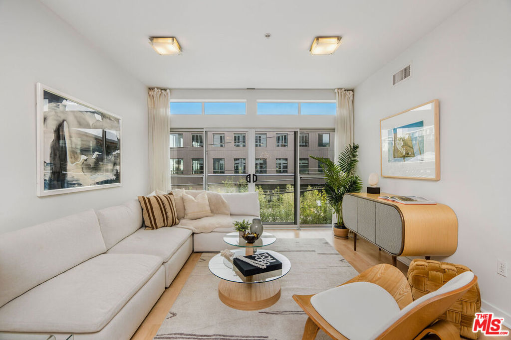 Progressively coastal!!! This 2 bed, 2 bath loft is located in the hot spot on the Westside. WestEnd is right in the heart of the Marina Arts District, around the corner from Marina Marketplace and a just over a mile from the beach! This loft has unique design elements which create light, airy and open living space with exposed wood beam columns. The kitchen has stainless steel appliances, Italian cabinetry, and Caesarstone counters. Bathroom features Hansgrohe fixtures, glass shower enclosures and deep soaking tub. The community features a remarkable interior courtyard with a fire pit and plenty of space for entertaining as well as hot and cool dipping pools alongside the BBQ. You will love your new lifestyle at WestEnd and in the Marina Arts District...from the AMC dine-in cinema, shops and restaurants all within a few blocks. Available Now! Moving Fee approx. $175 per move per HOA, Renter's insurance required, w/d, all appliances, moveable kitchen island and Wall shelving in kitchen area included. Pets are up to owner's discretion. 2 parking spots (tandem) with additional bike storage in the garage. Applications through RentSpree - each tenant must fill out an application. (Unit is vacant - furniture is from past photos. All walls are painted white).